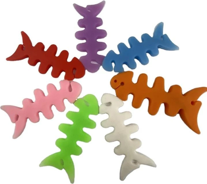 Mbështjellës kabllo për kufje Hurtel, formë peshku, plastikë, i gjelbër