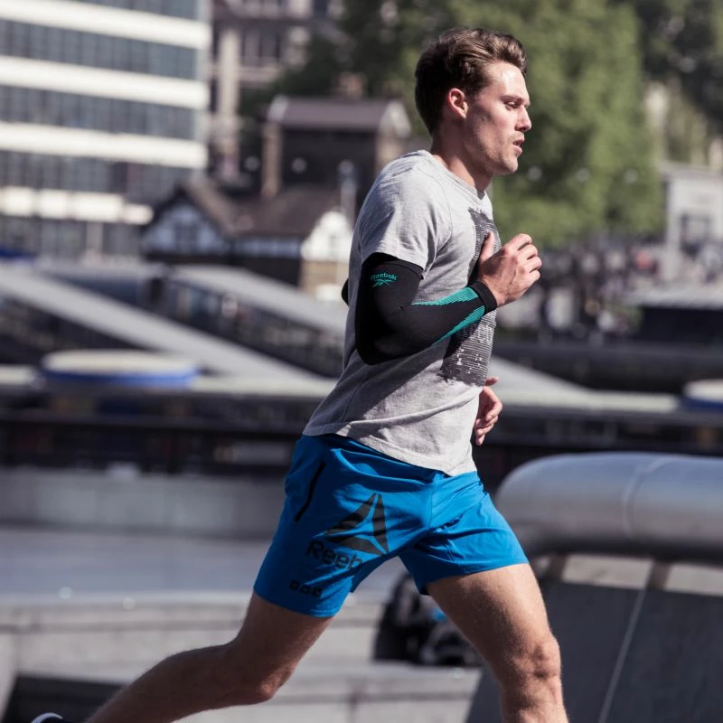 Doreza kompresimi Reebok për meshkuj dhe femra, të zeza dhe jeshile