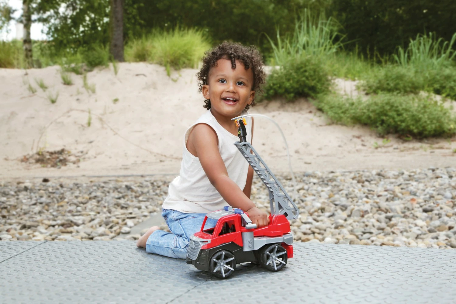 Kamion zjarrfikës lodër Lena Truxx2 me figurë, plastikë, 28cm, kuq/gri