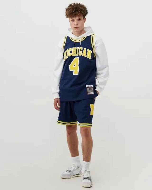 Fanellë për meshkuj Mitchell & Ness NCAA Swingman Road Jersey Michigan1991 Chris Webber, blu marine
