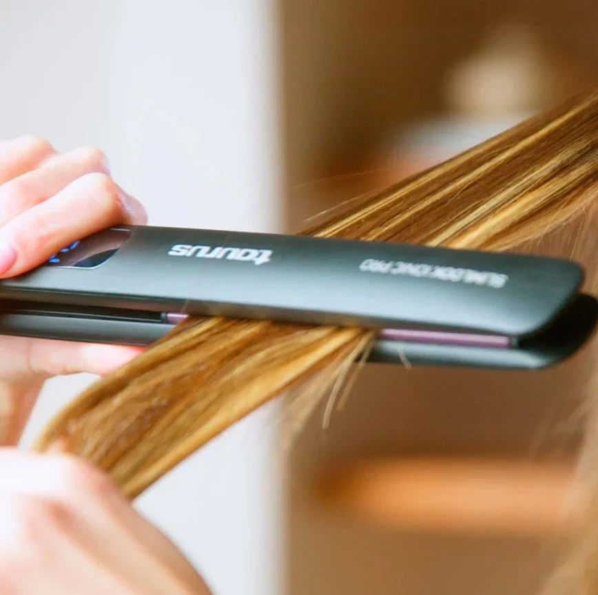 Hekur për drejtimin e flokëve Taurus Slimlook Ionic Pro, i zi