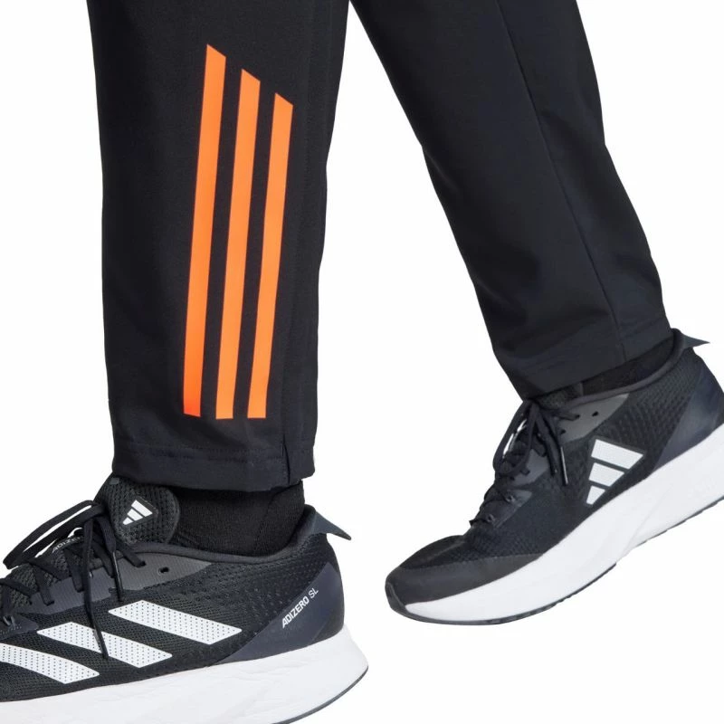 Pantallona sportive adidas për meshkuj, të zeza dhe portokalli