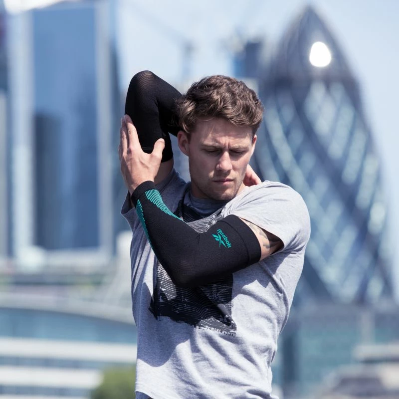 Kompresion mëngë Reebok për meshkuj dhe femra, të zeza dhe jeshile