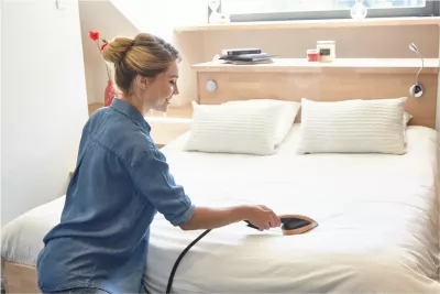 Avulluesi Tefal QT 2020 IXEO Power, i zi