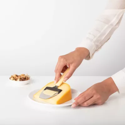 Prerës djathi Brabantia Tasty+ 126222, çelik inox, dorezë plastike, i verdhë