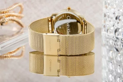 Orë dore për femra Calvin Klein, të arta