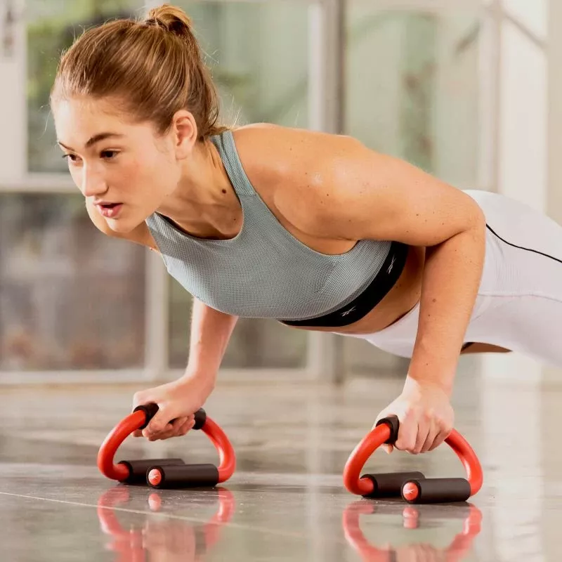 Doreza për Push-up Reebok, të zeza me të kuqe
