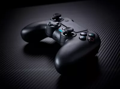 Kontroller wireless Nacon PS4 Asymmetric, deri 7 orë bateri, prizë 3.5mm, i zi